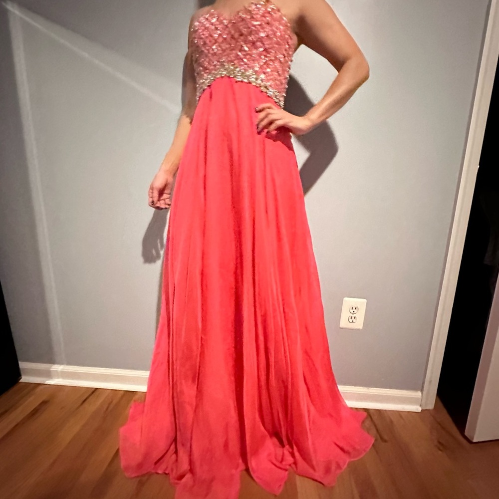 NWT Brand New Beaded Orange Promdress with tags. Size 2